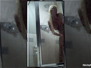Home movie of Nikita Von James taking a shower